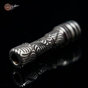 ArtBox drip tip acciaio – vista laterale con finitura scura e lucida